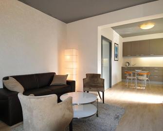 Newly designed apartment for 2-4 persons, lake access and WLAN free of charge - Finkenstein am Faaker See - Wohnzimmer