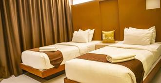 Os Hotel Airport Batam - Batam - Bedroom