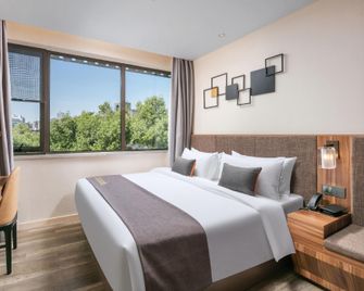 Home Inn Plus Hangzhou West Lake Lakeside Hefang Pedestrian Street - Hangzhou - Habitación