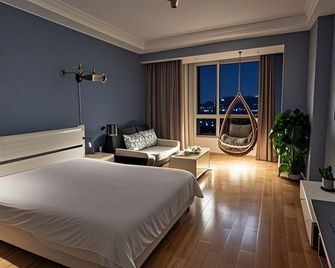 Xinyuelai Theme Apartment Hotel,Laochenggen G Park store - Tây An - Phòng ngủ