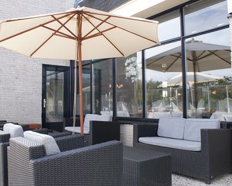 尼維萊特巴德弗萊徹餐廳酒店 - 尼維萊特巴德 - 天井
