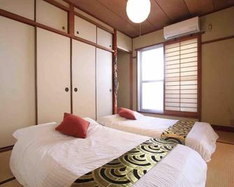 جوراكو شينفوكاي - أوساكا - غرفة نوم
