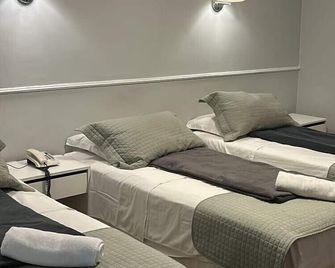 Hotel Petit Village Icaraí - Niterói - Chambre