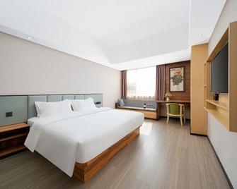 Zhuang Yuan Po Hotel - Nanning - Habitación