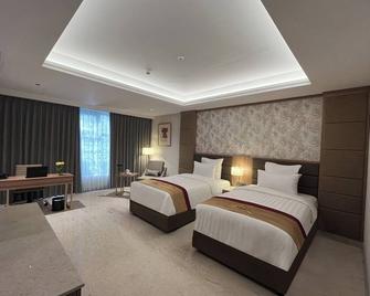 Grand Travello Hotel Bekasi - Cikarang - Ložnice