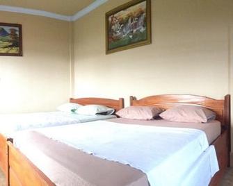 Mr.Din Rinjani Trails Hotel - Senaru - Bedroom
