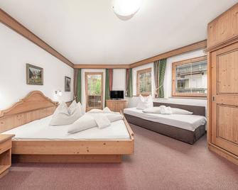 Alpenhotel Tirolerhof Gerlos - גרלוס - חדר שינה