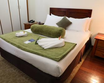 Huon Gulf Hotel - Lae - Bedroom