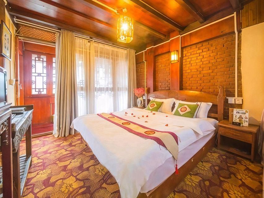 Lijiang Mufu Yuan Inn - ליז'יאנג - חדר שינה