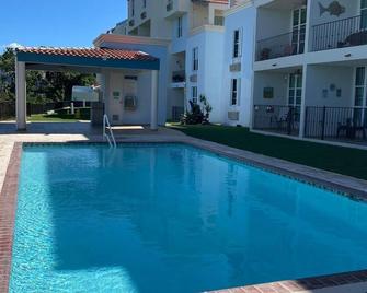 Bahia Real apartment located front of the pool - Cabo Rojo - Piscina