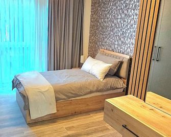 Hira Boarding Aparthotel - Dingolfing - Bedroom
