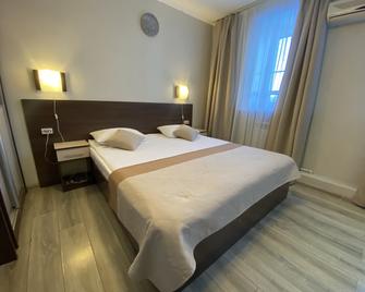Hotel Onega - Chabarowsk - Schlafzimmer