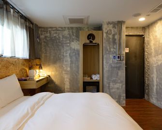 Hualien Wow Hostel - הואליין סיטי - חדר שינה