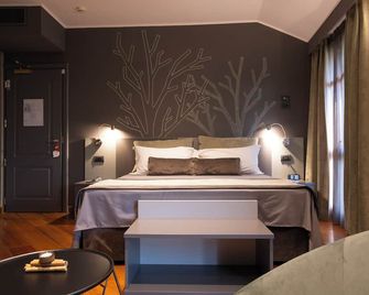 Romantic Hotel Furno - San Francesco al Campo - Ložnice