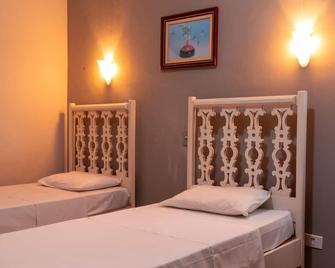 Rede Andrade Guaíra - Curitiba - Phòng ngủ