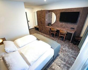 Jg Hotel Antoniergasse - Меммінген - Спальня