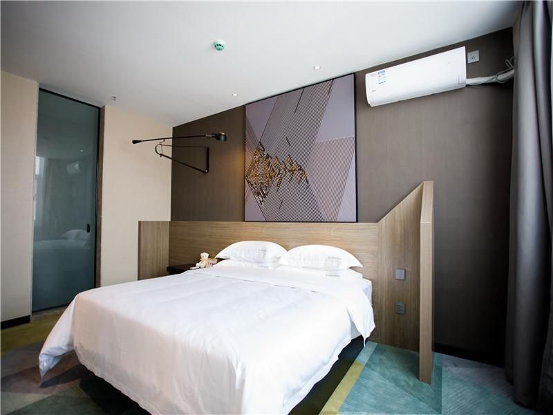 Iu Hotels· Xincheng Haibing University Store - Huludao - Camera da letto