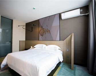 Iu Hotels· Xincheng Haibing University Store - Huludao - Camera da letto