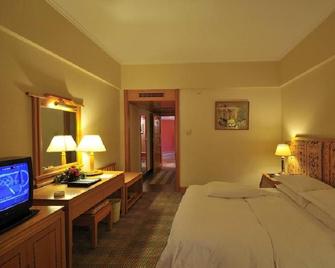 Guanfang Hotel (Lijiang Old Town Dashiche) - 麗江 - 寝室