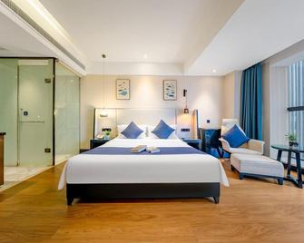 Red Box Exquisite Hotel - Luzhou - Bedroom