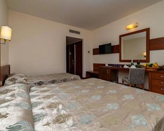Amelia Beach Resort Hotel - Kizilot - Schlafzimmer