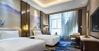 Wanda Vista Urumqi - Ürümqi - Kamar Tidur