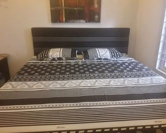 Harry & Mimin Homestay - Gorontalo - Bedroom