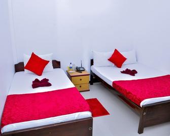 Hotel Aathithan Trincomalee - Трінкомалі - Спальня