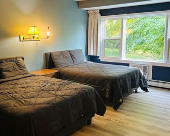 Capital O Swan Inn Comstock Park - Comstock Park - Habitación