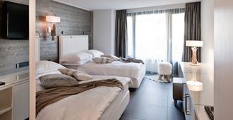 Morosani Fiftyone - the room only Hotel - Davos - Habitación