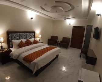Hotel Executive Lodge - Bahāwalpur - Habitación