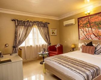 Apartment Royale Hotel & Suite - Lagos - Schlafzimmer