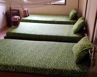 Climbers Home - Moshi - Schlafzimmer