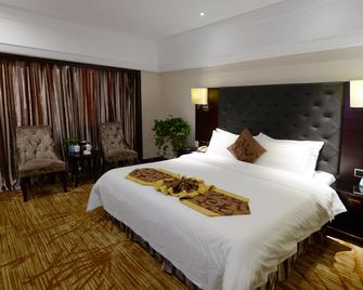 New Asia Liuye International Hotel - Changde - Slaapkamer