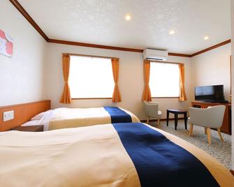 Business Hotel Star - Beppu - Schlafzimmer