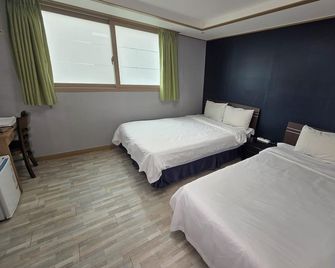 Olle Tourist Hotel - Ciudad de Jeju - Habitación