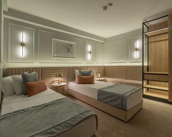 Hotel Bavaria Blu - מאמאיה - חדר שינה