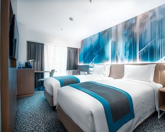 Holiday Inn Express Manila Newport World Resorts by IHG - פאסאי סיטי - חדר שינה