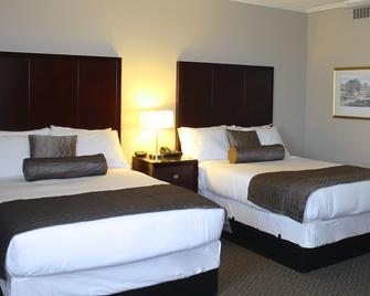 Capital City Center Hotel - Victoria - Bedroom