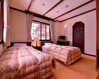 Resort Inn Chirorian - Takayama - Schlafzimmer