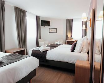 هوتل ريد فوكس - لو توكيه - غرفة نوم