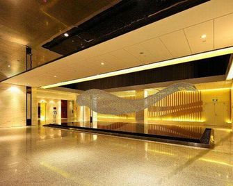 Riguang Hai'an Holiday Apartment (Qingdao Zhonglian Free Harbor) - تشينغداو - ردهة