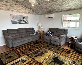 Lake Shamineau Retreat with private beach and dock! - Motley - Living room
