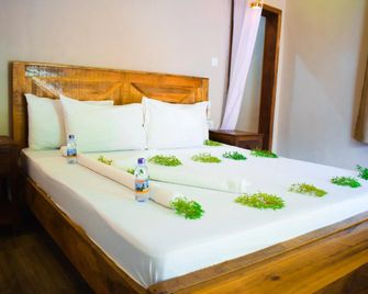 Kikoi Boutique Hotel - Pingwe - Bedroom