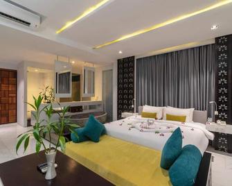 King Rock Boutique Hotel - סיאם ריפ - חדר שינה