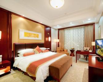 Yancheng Shuicheng Hotel - Янчен - Спальня