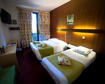 Le Grand Hôtel de Besse - Besse-et-Saint-Anastaise - Schlafzimmer