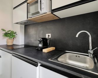 Joivy Delightful Studios Near Parco Tre Torri - Milan - Phòng bếp
