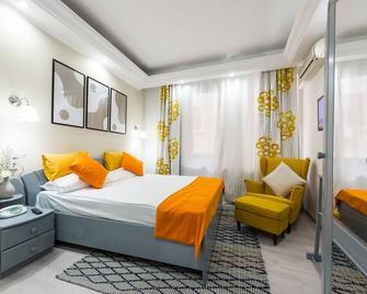 Relax Comfort Suites - Bucharest - Phòng ngủ