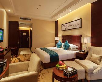 Xinxing Century Hotel - Leshan - Habitación